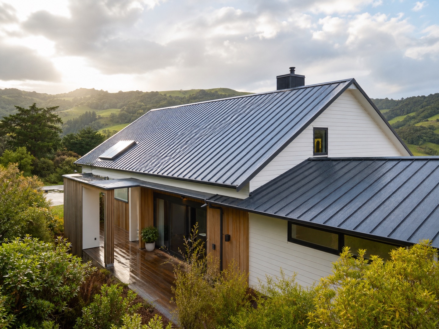 Freshly restored deep slate roof on a hillside home